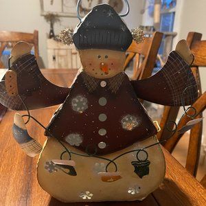 Snowman tin candle decor